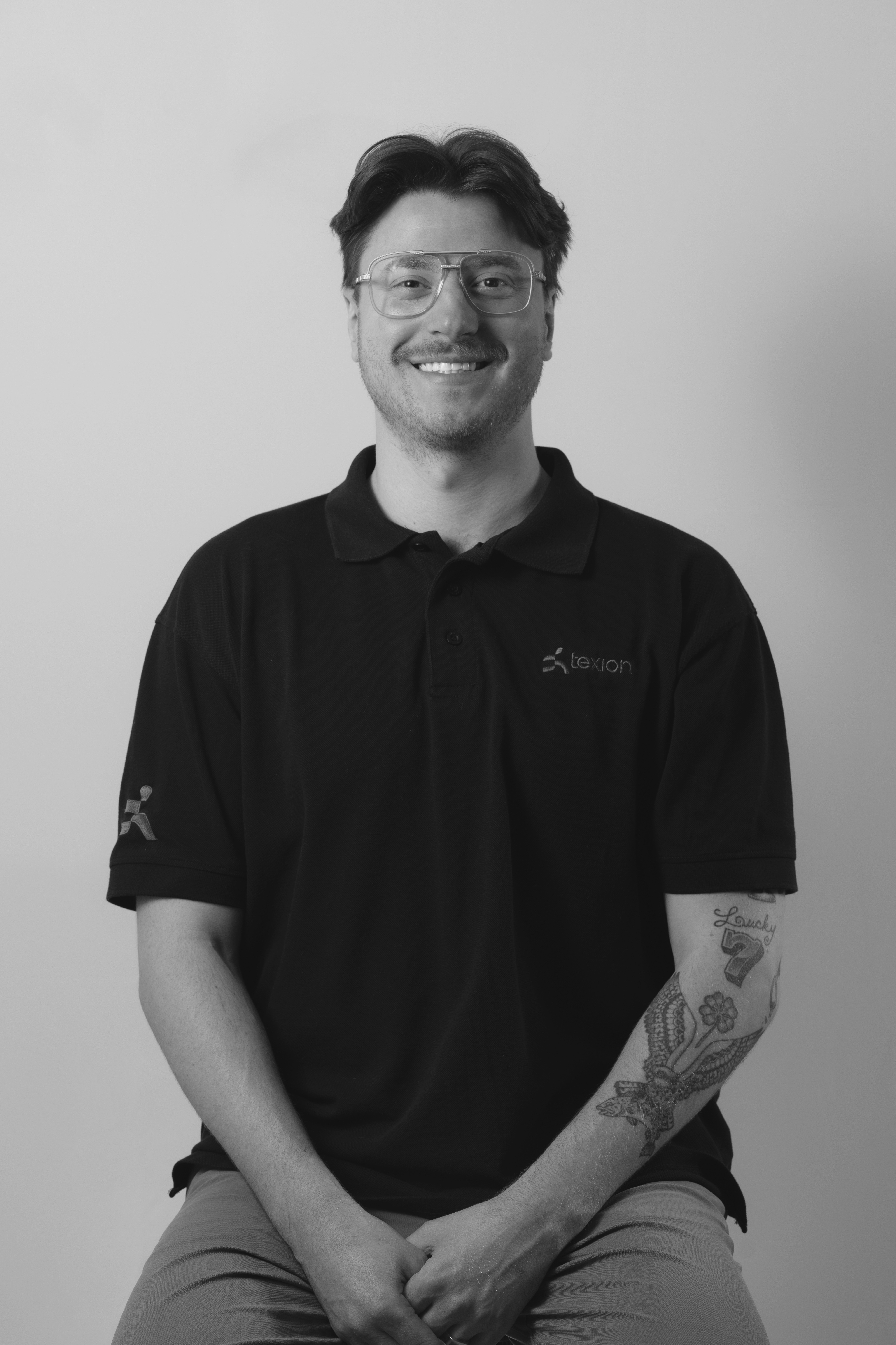 Profile photo of Frédéric-Charles Boisvert sitting and smiling.