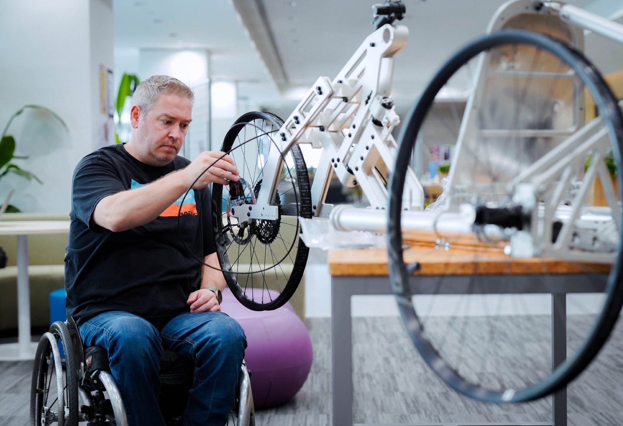 Noel Joyce assembling the mountain bike at NYU Shanghai (photo credit: NYU Shanghai)