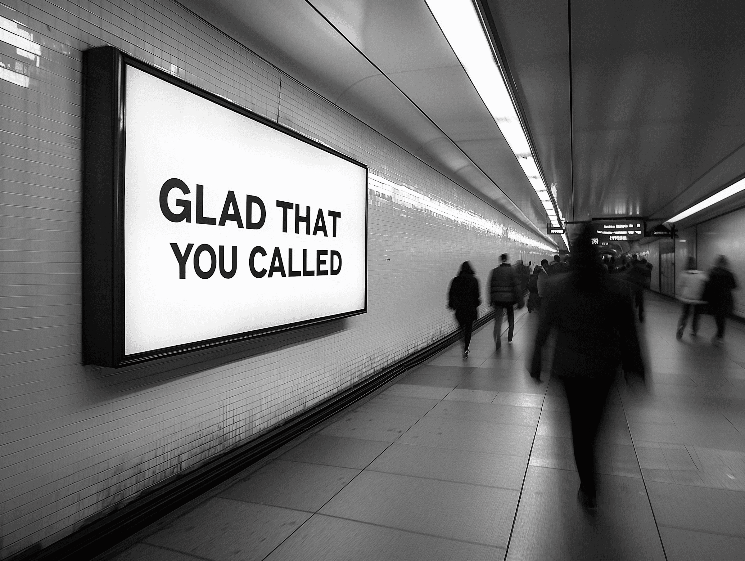 Underground passage with billboard reading “Glad that you called”