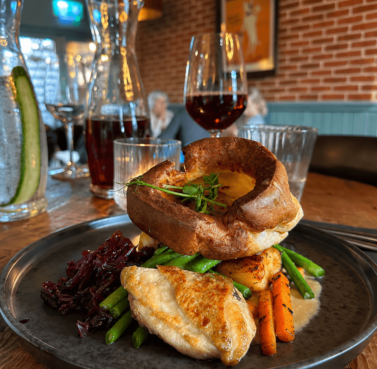 A Sunday roast with Yorkshire pudding and seasonal vegetables at The Faulkner