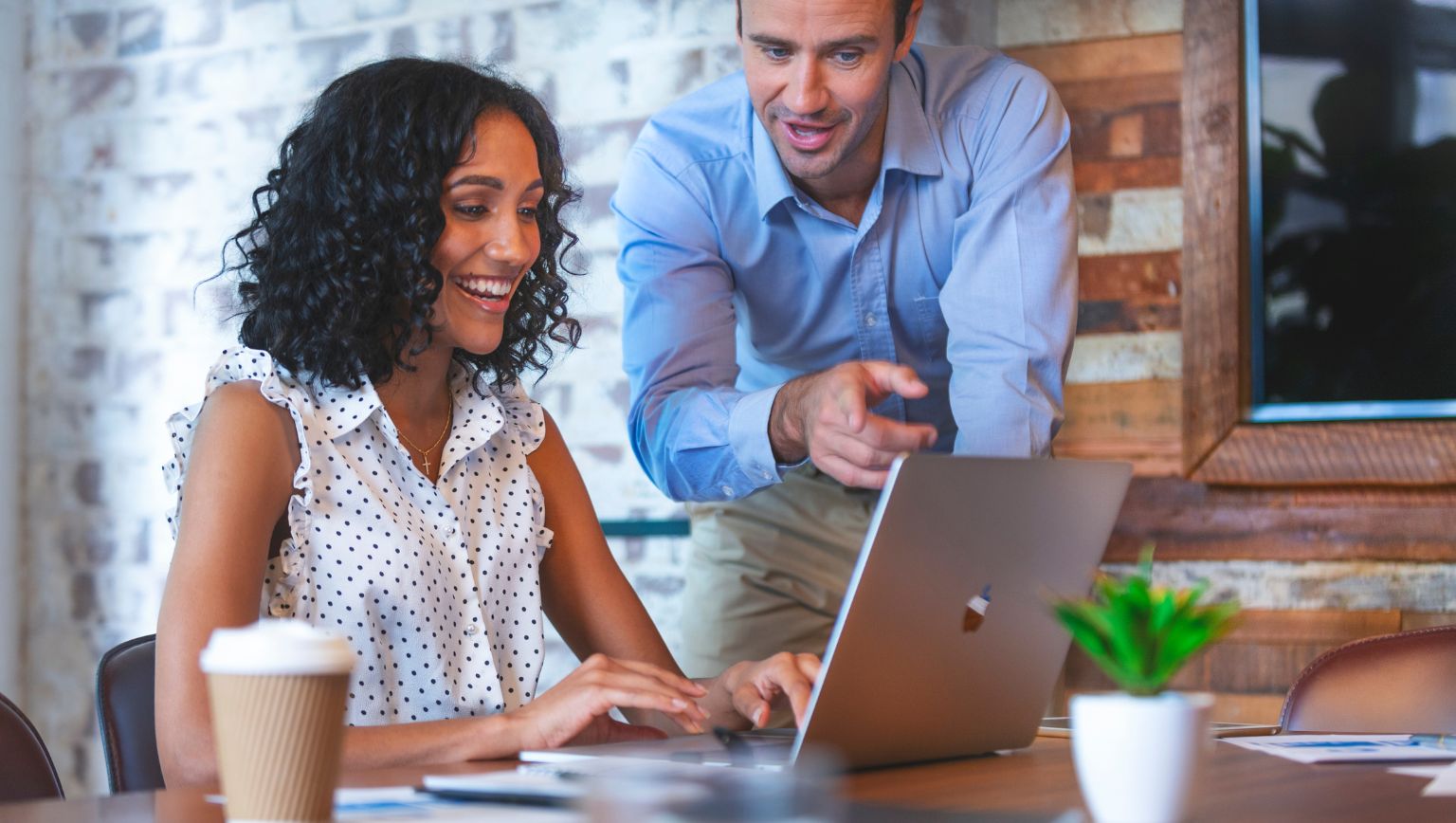 brown wooden kitchen cupboard near wall
