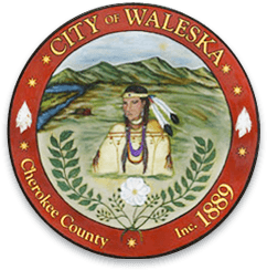 Official seal of the City of Waleska, Georgia, featuring a Native American figure, Cherokee County, and the year 1889.