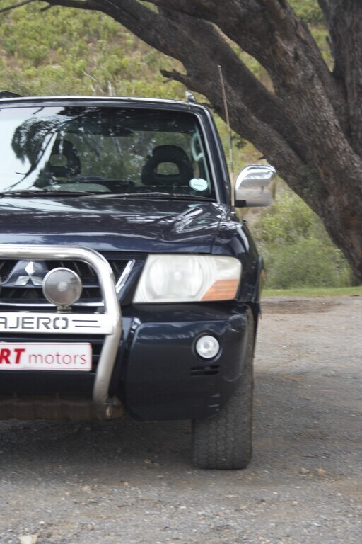 man in white crew neck shirt wearing black framed eyeglasses
