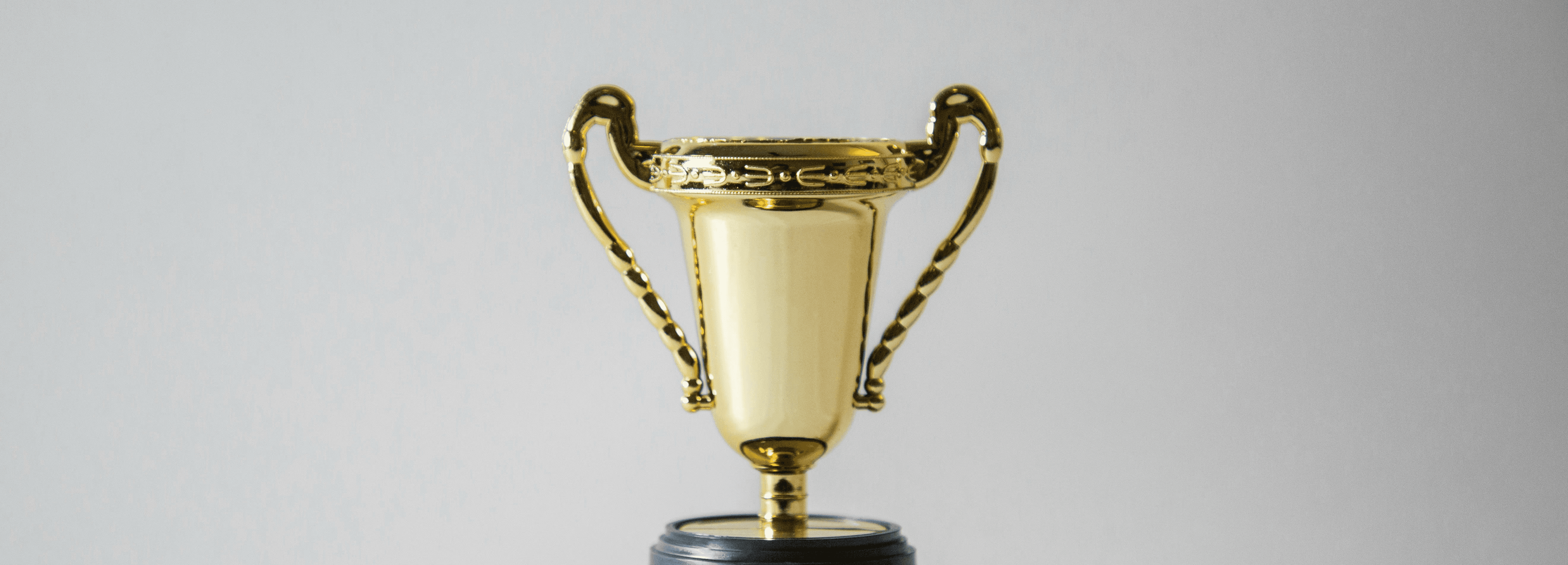 yellow and white trophy