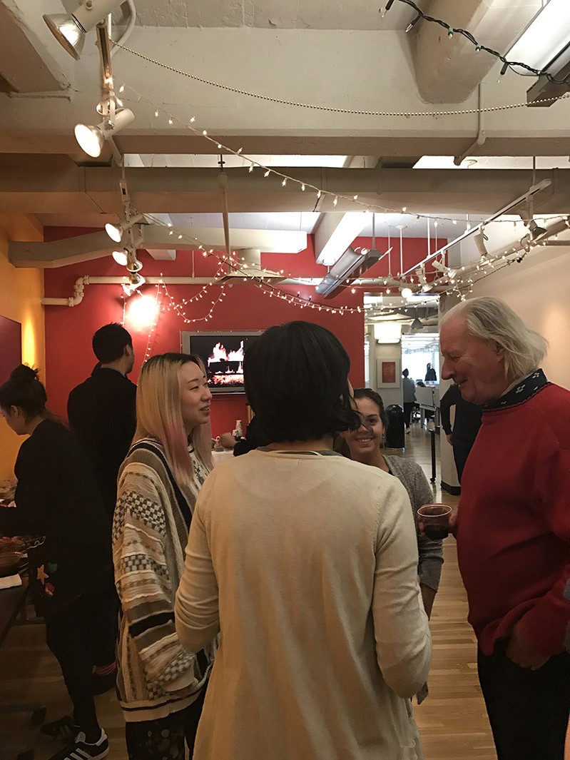 photo of four persons talking