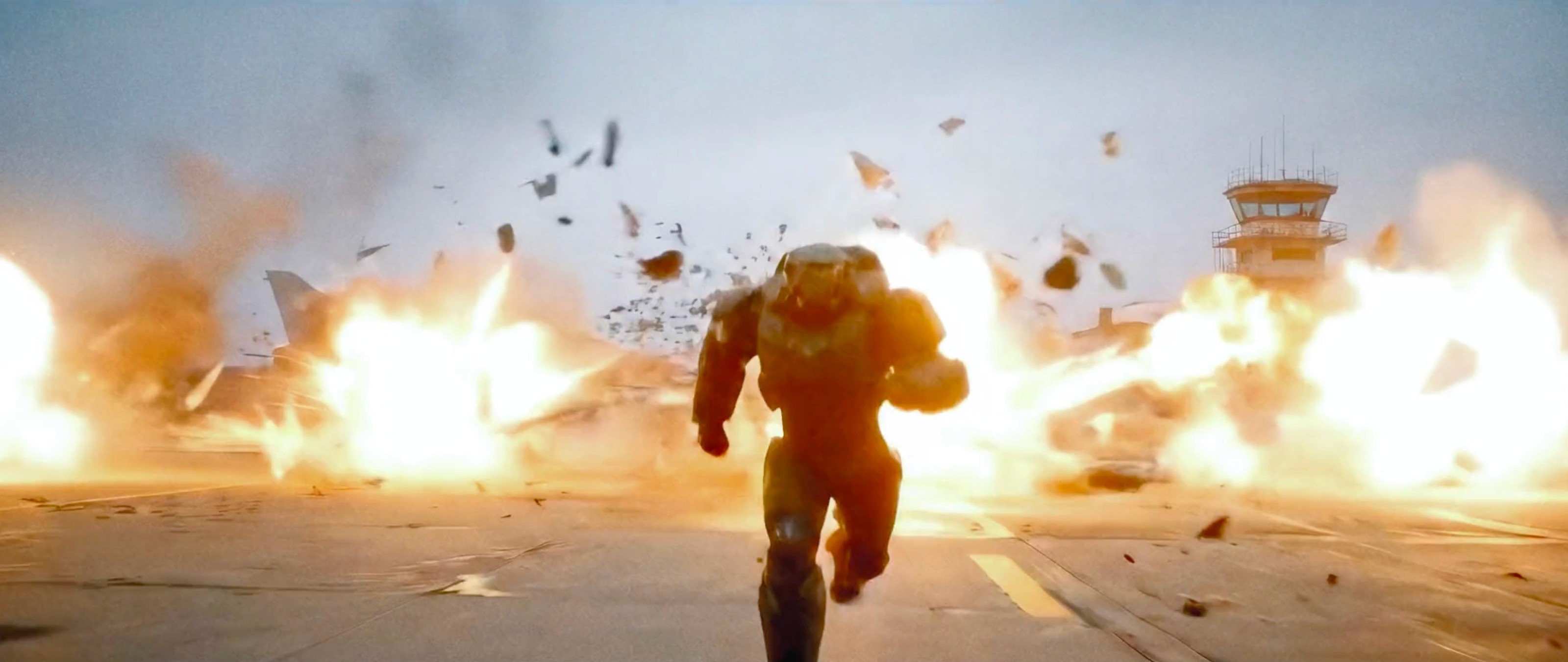 Hollywood-style AI action scene of an armored figure sprinting through explosions on a runway.