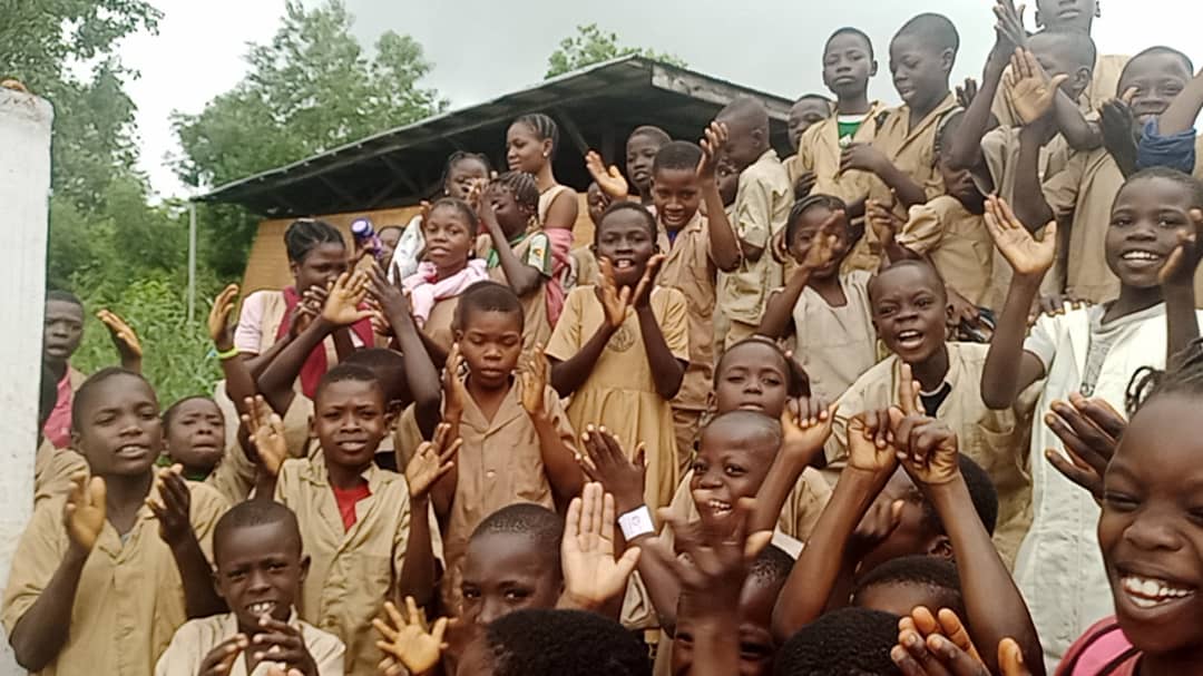 white ouse surounded with grass