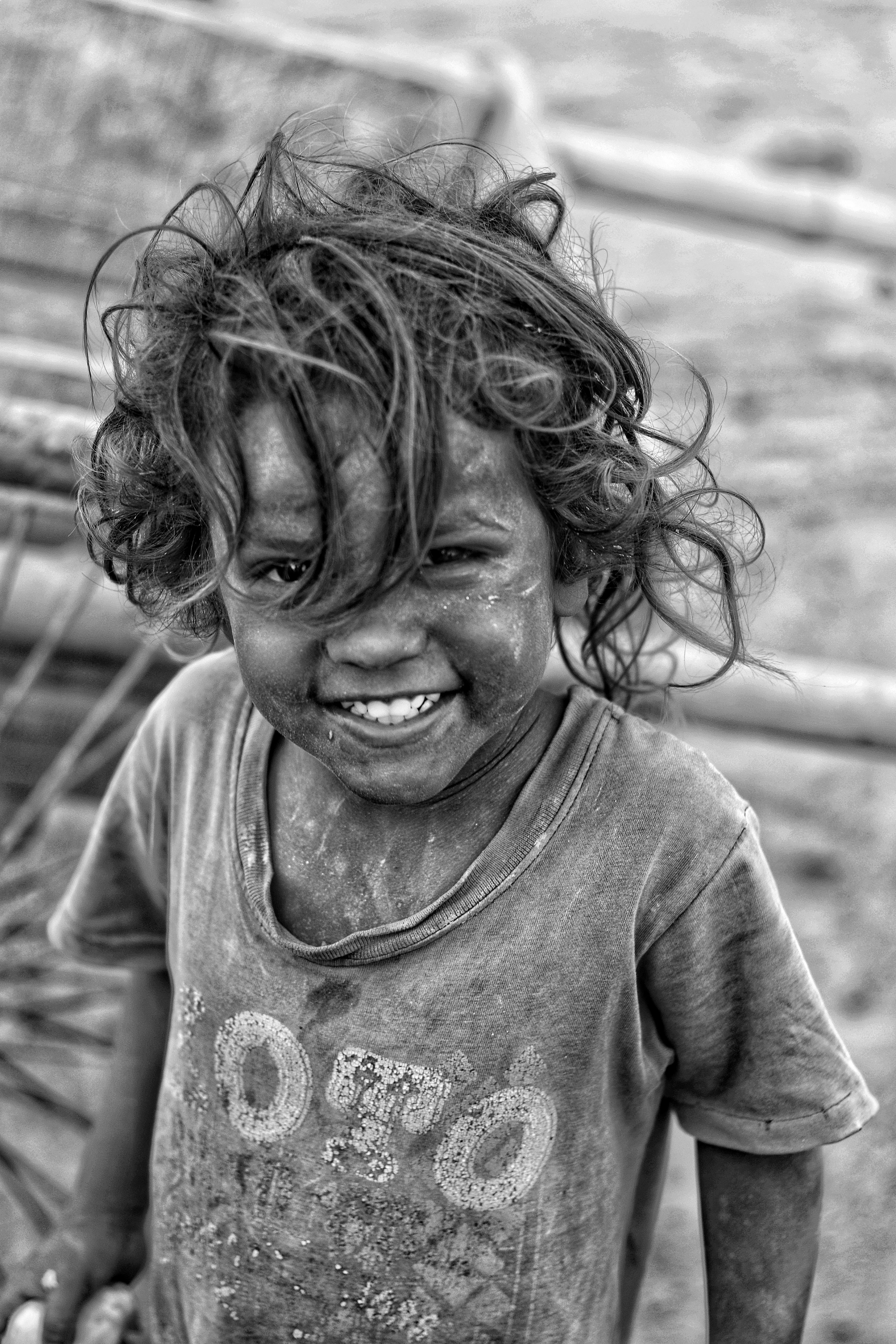 three children at the beach during golden hour