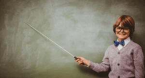 Person holding a long stick in front of an easel.
