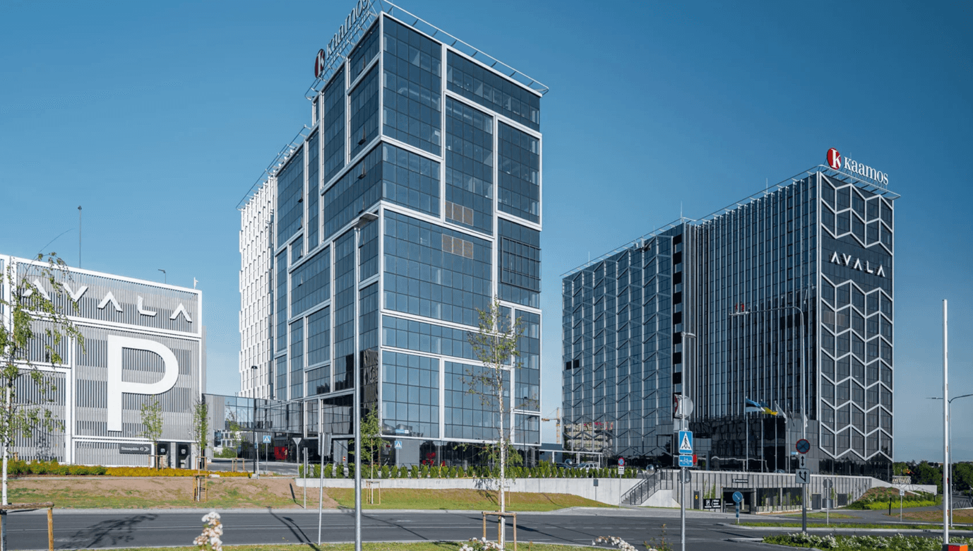 A building with glass windows
Description automatically generated