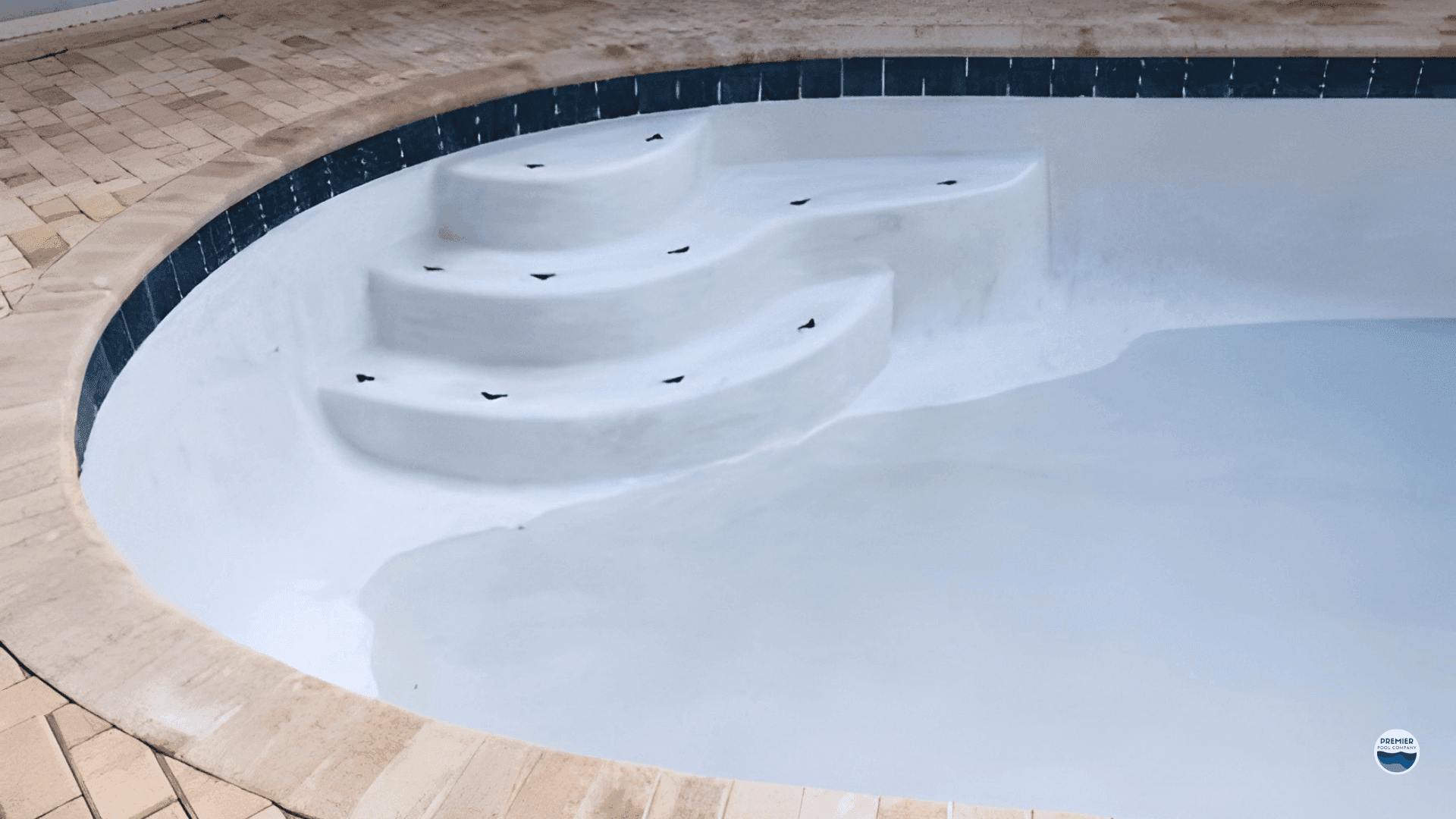 Concrete pool liner surface showing durability and custom design options