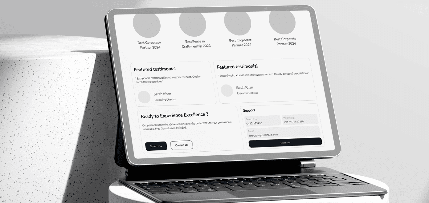 A small black poodle is being petted by a person.