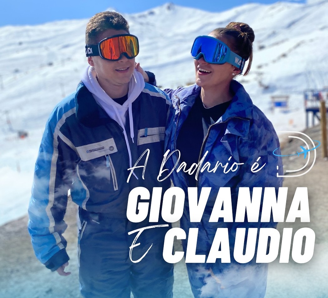 Woman logistics manager using a tablet in a busy warehouse.