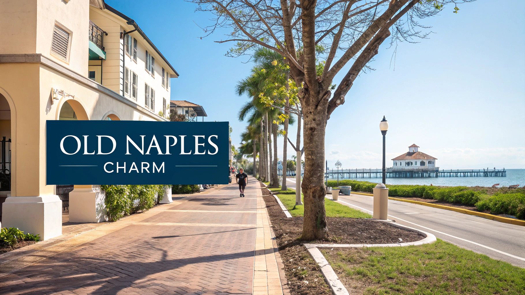 A sunny street scene in Old Naples with historic buildings, palm trees, a person walking, and a pier extending into the water.