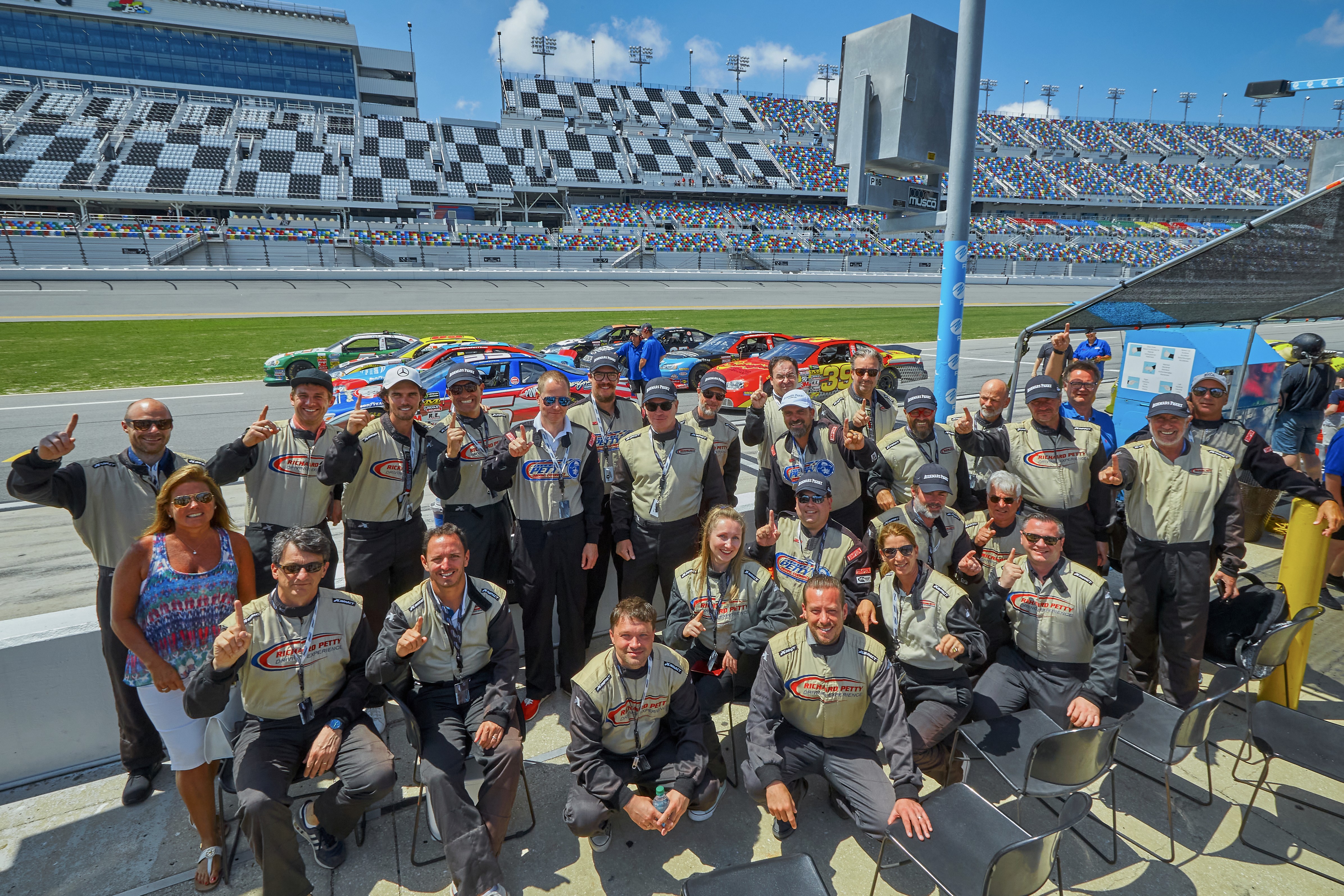 Group of Audemars Piguet VIP guests in Florida for Daytona track day– luxury event photography by Paul Severn, London.