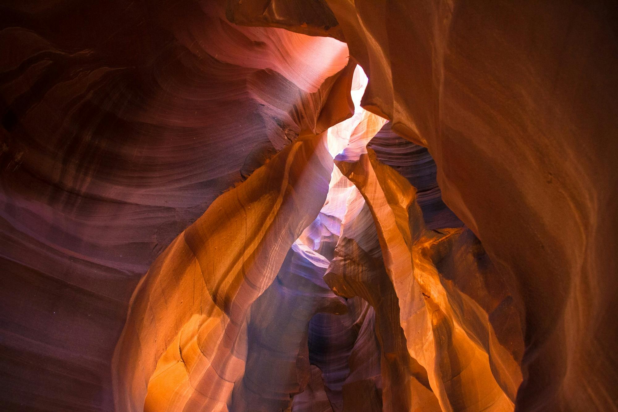 Artistic geology shapes with light shining through, representing growth and discovery