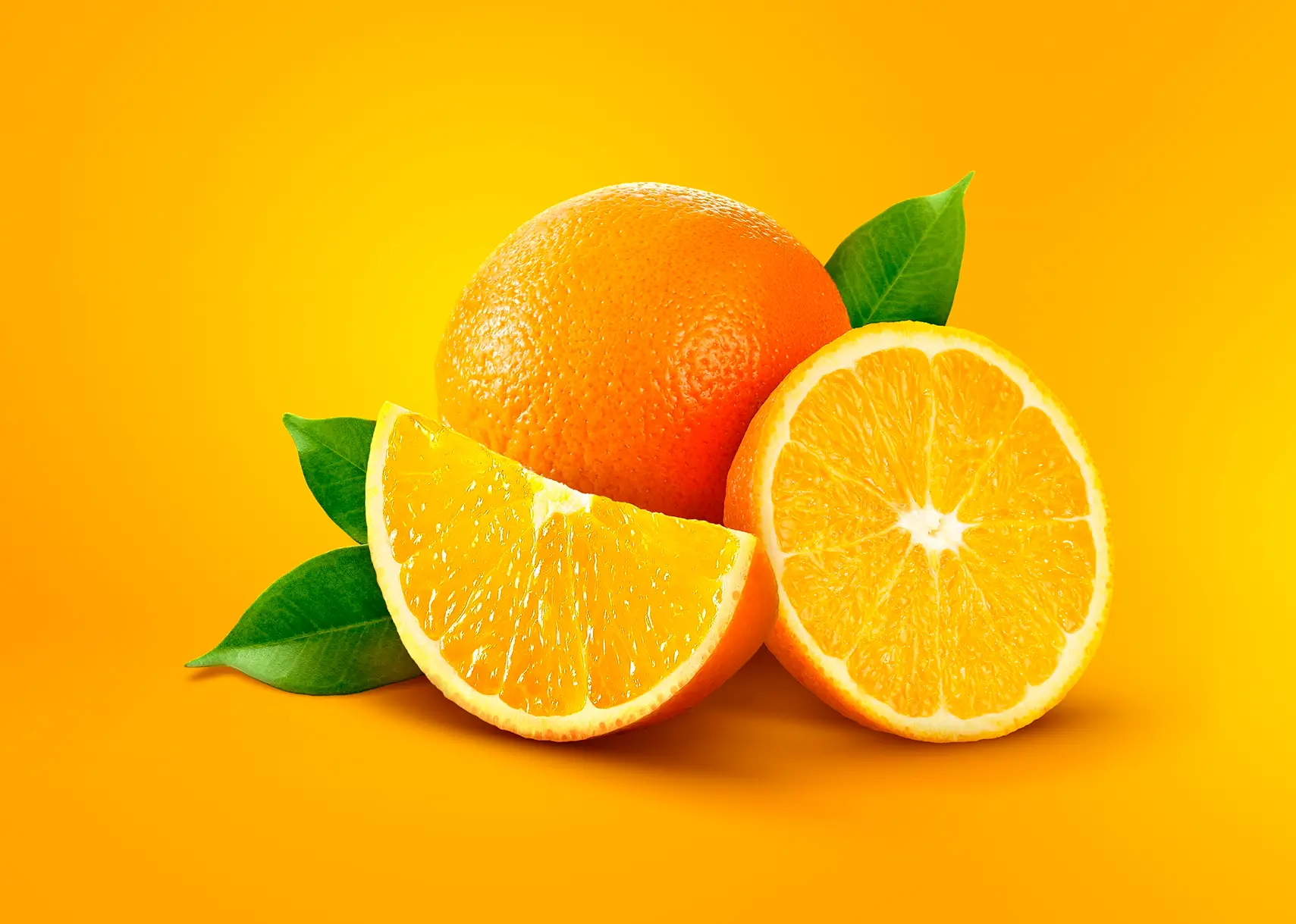 Image manipulation composition featuring whole and sliced oranges with green leaves over a vibrant solid orange background with soft lighting.