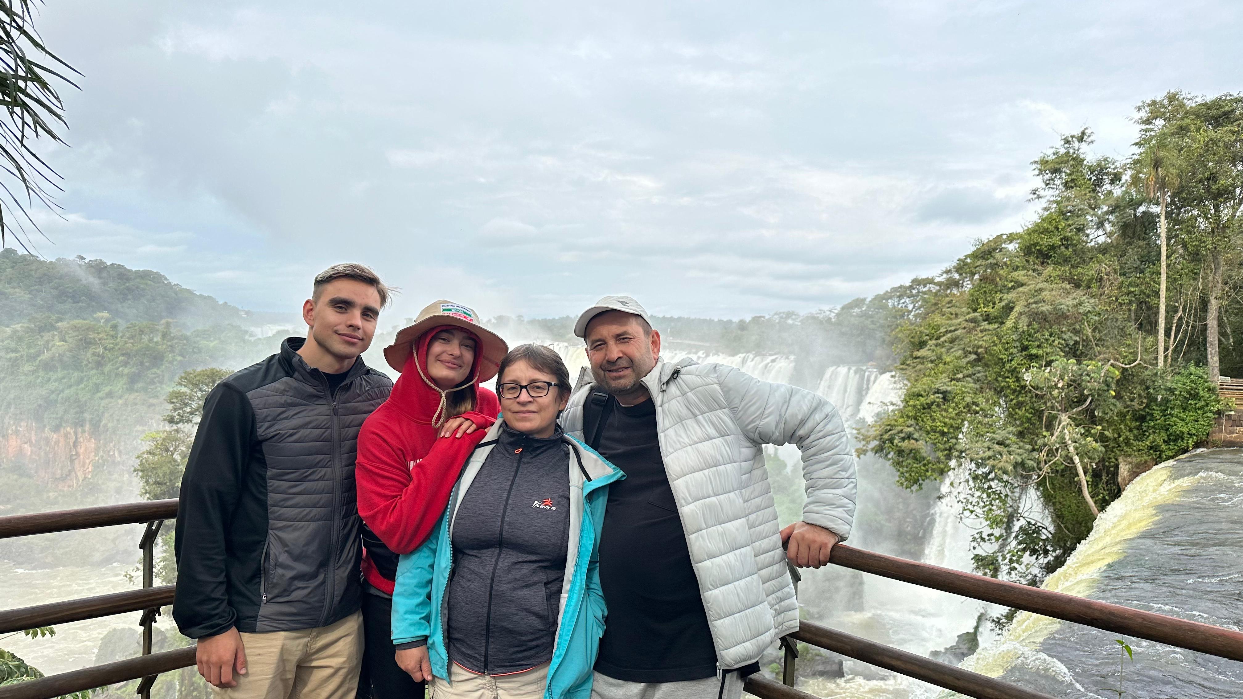 Svetlana Gabitova with her family in front of Iguazú Falls, Argentina.