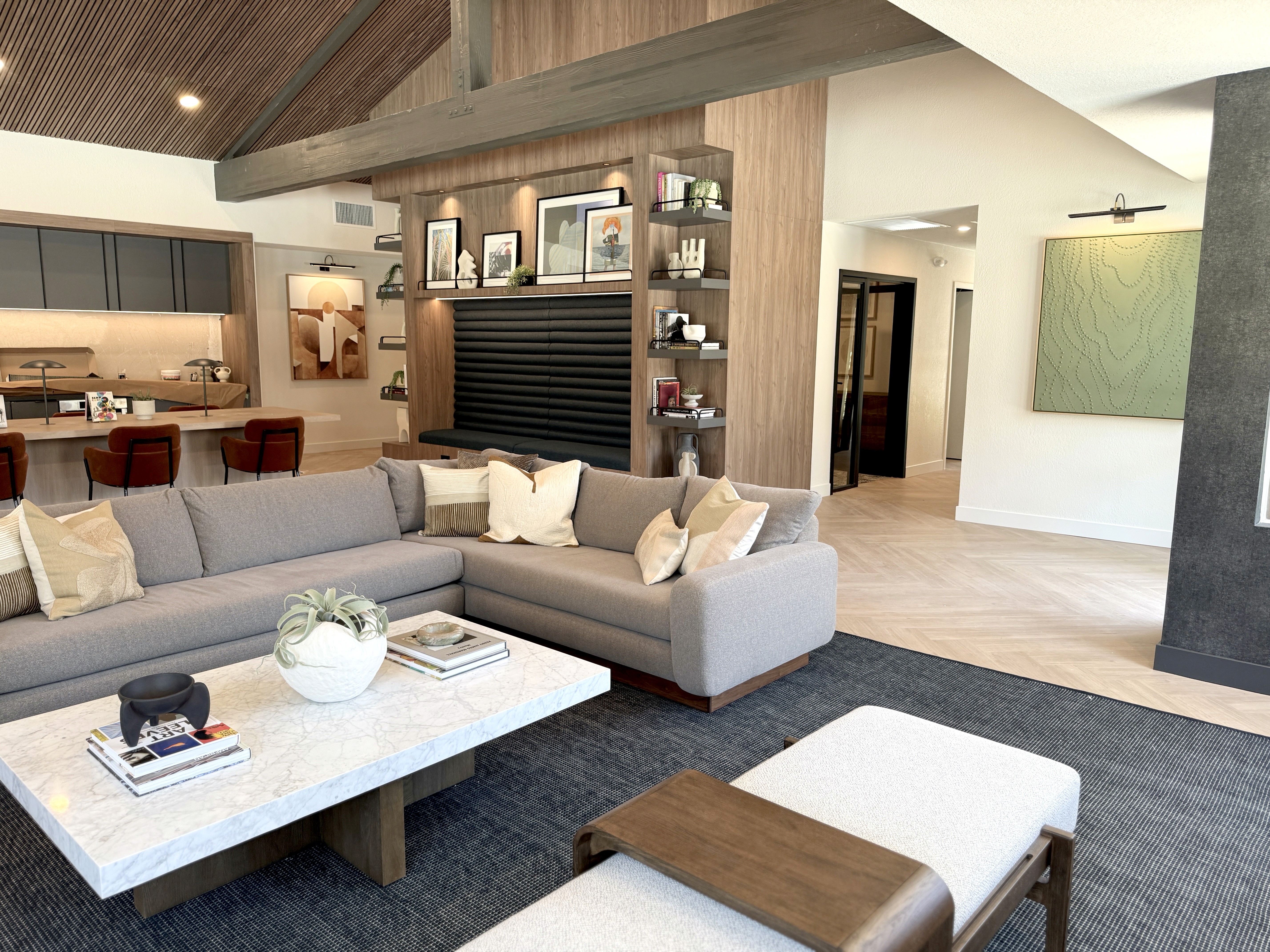 a white wall with a metal number two on it