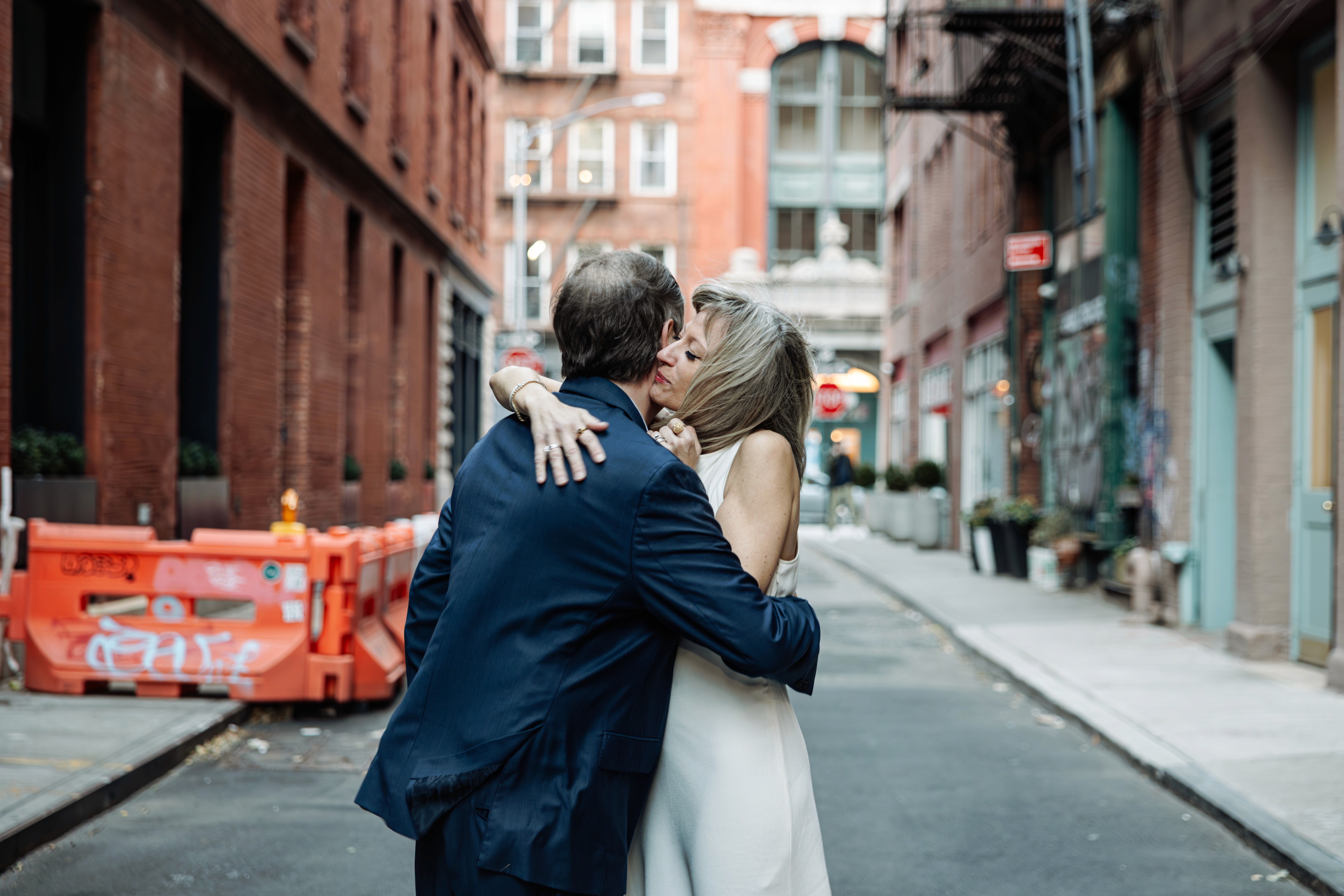 Couple in embrace at Staple Street in Tribeca NYC photographer Lizz Spano Photography