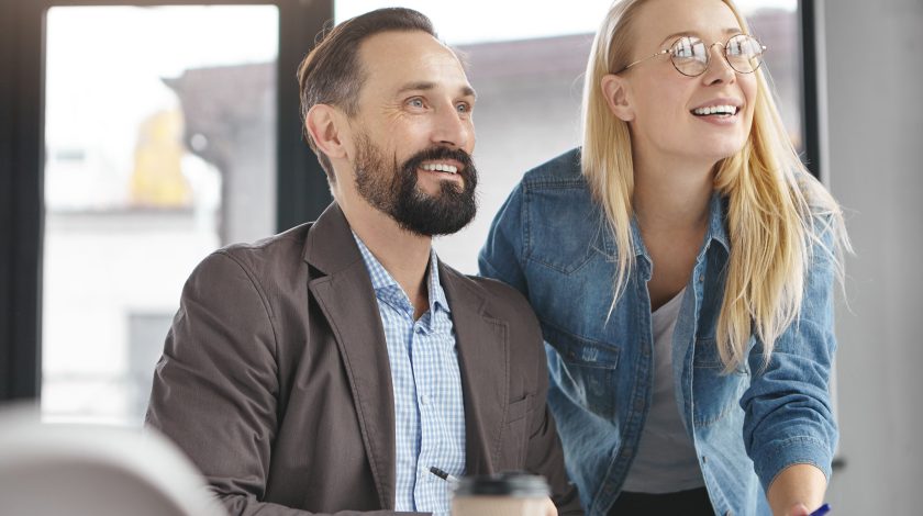 Two people smiling at eachother
