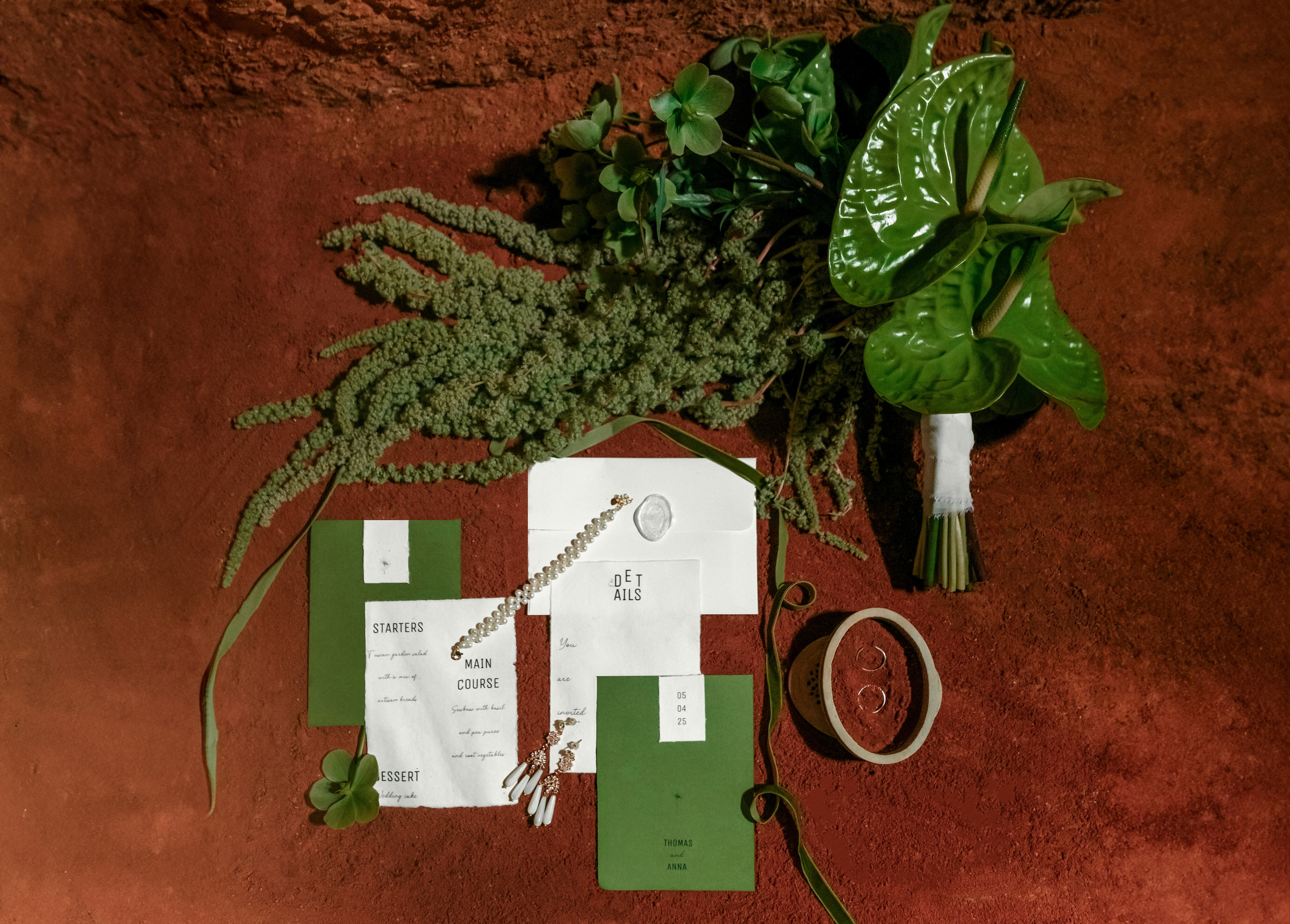 Delicate green foliage and pink flowers.