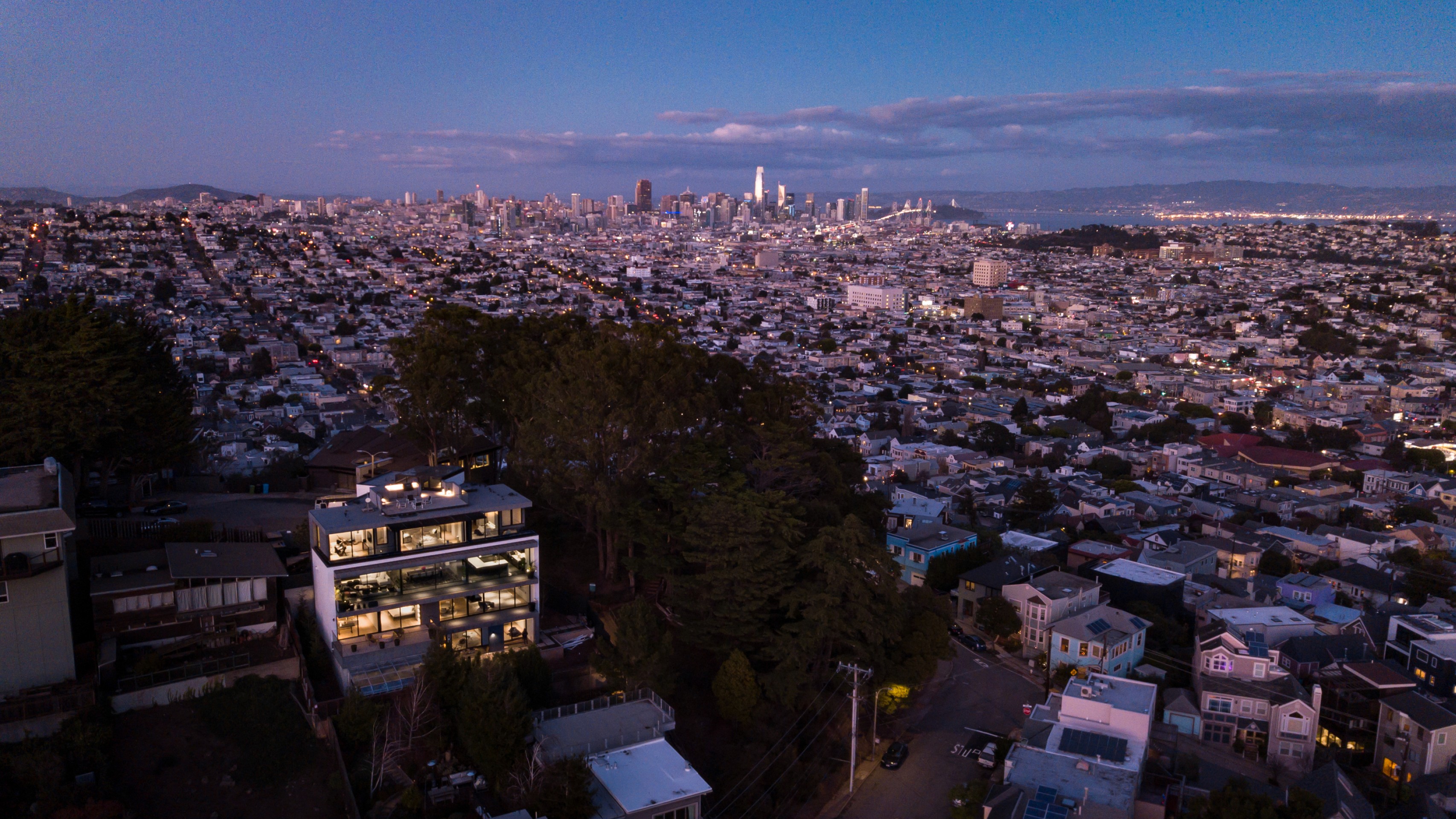 aerial view of modern residence in front of San Francisco skyline