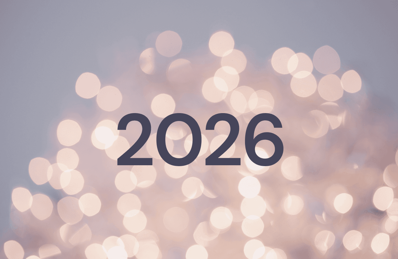 two women sitting beside table and talking