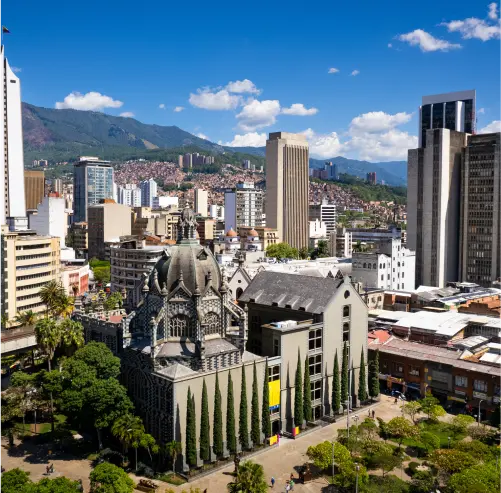 a view of a city with a mountain in the background