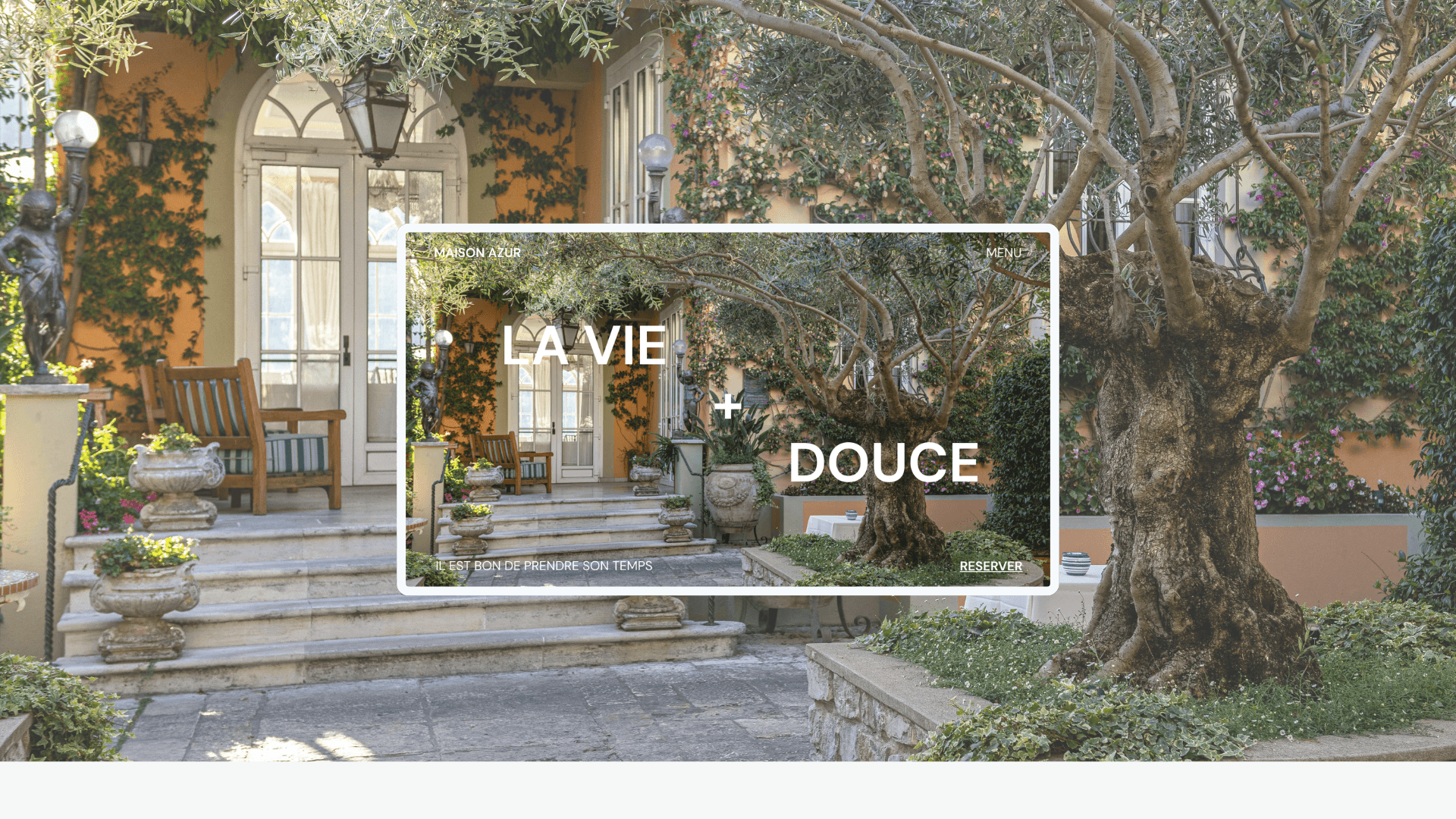 contemporary glass home with lawn