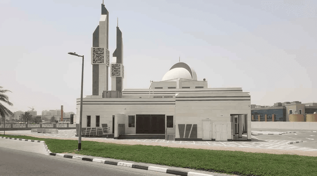 A mosque with two towers located on the side of the road at Semmer Villas.