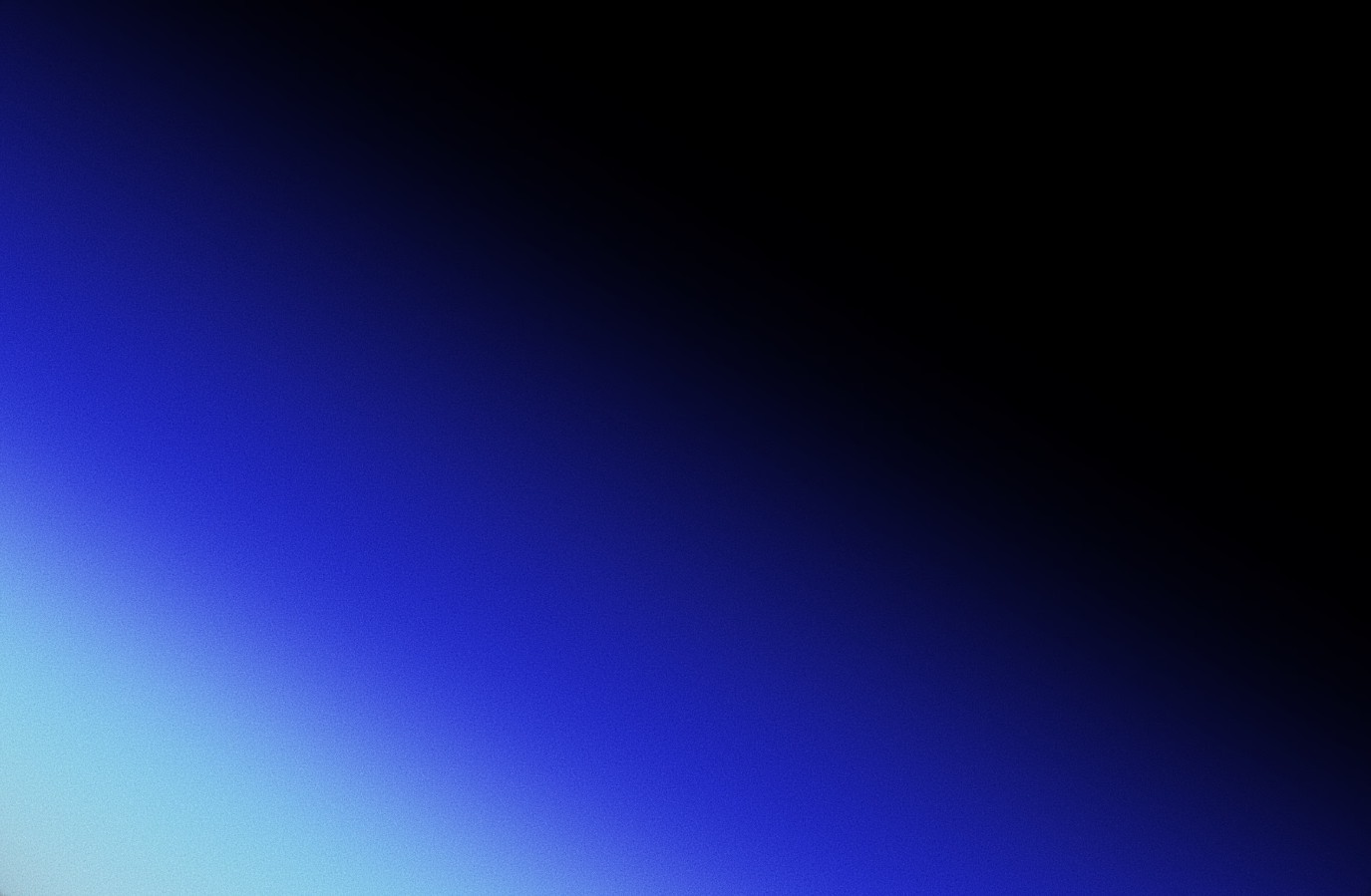 a gloved hand holding a test tube filled with liquid