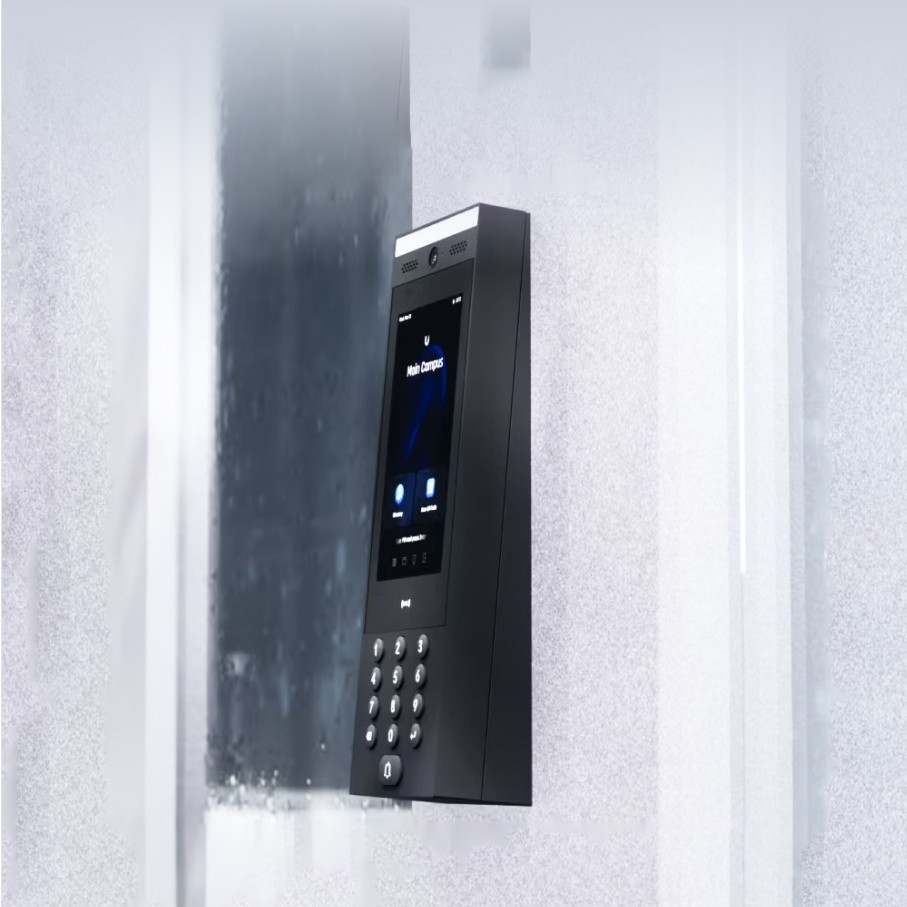 Angled surface-mounted intercom system with keypad and display for easier user interaction.