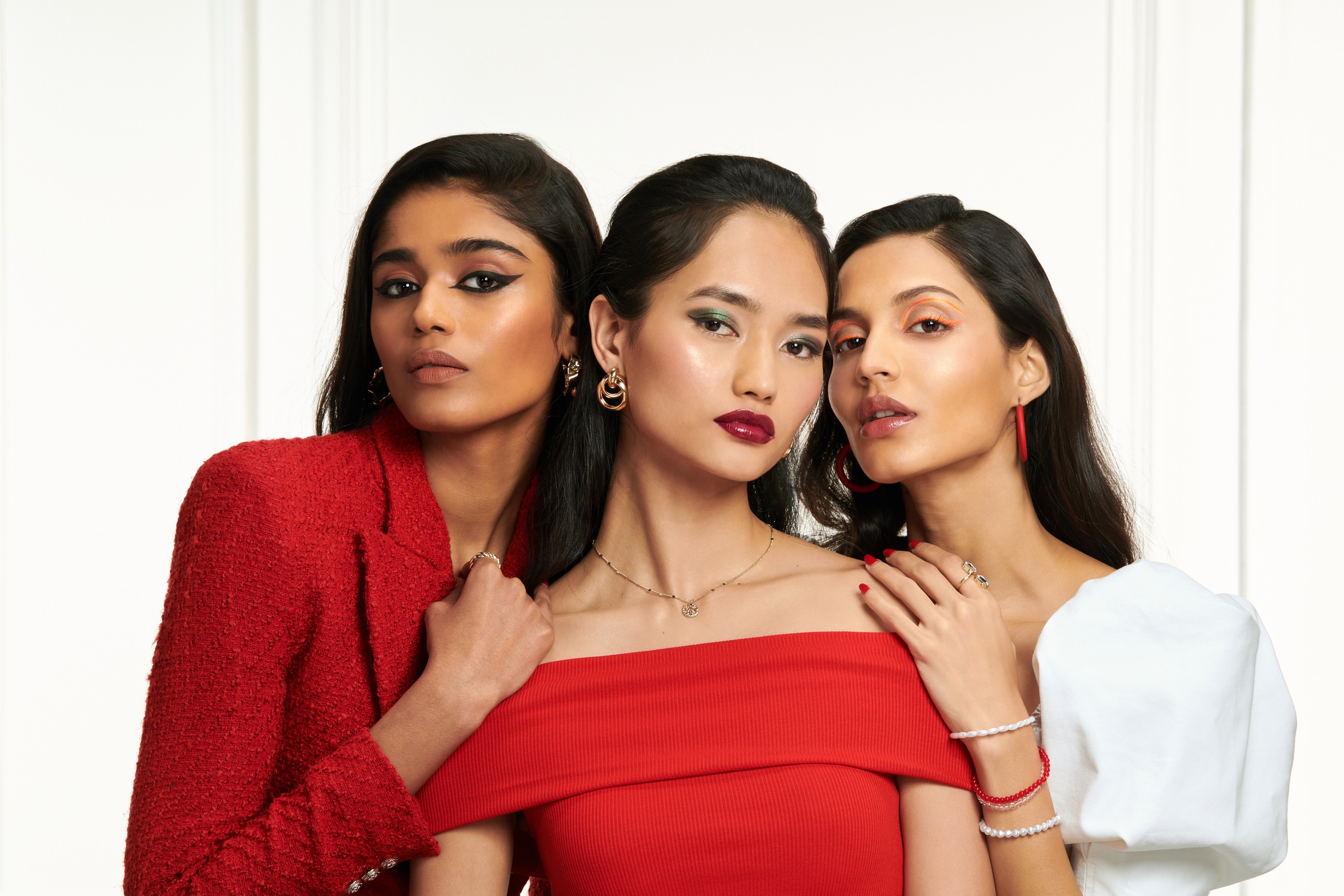 Two people talking on a rooftop at sunset