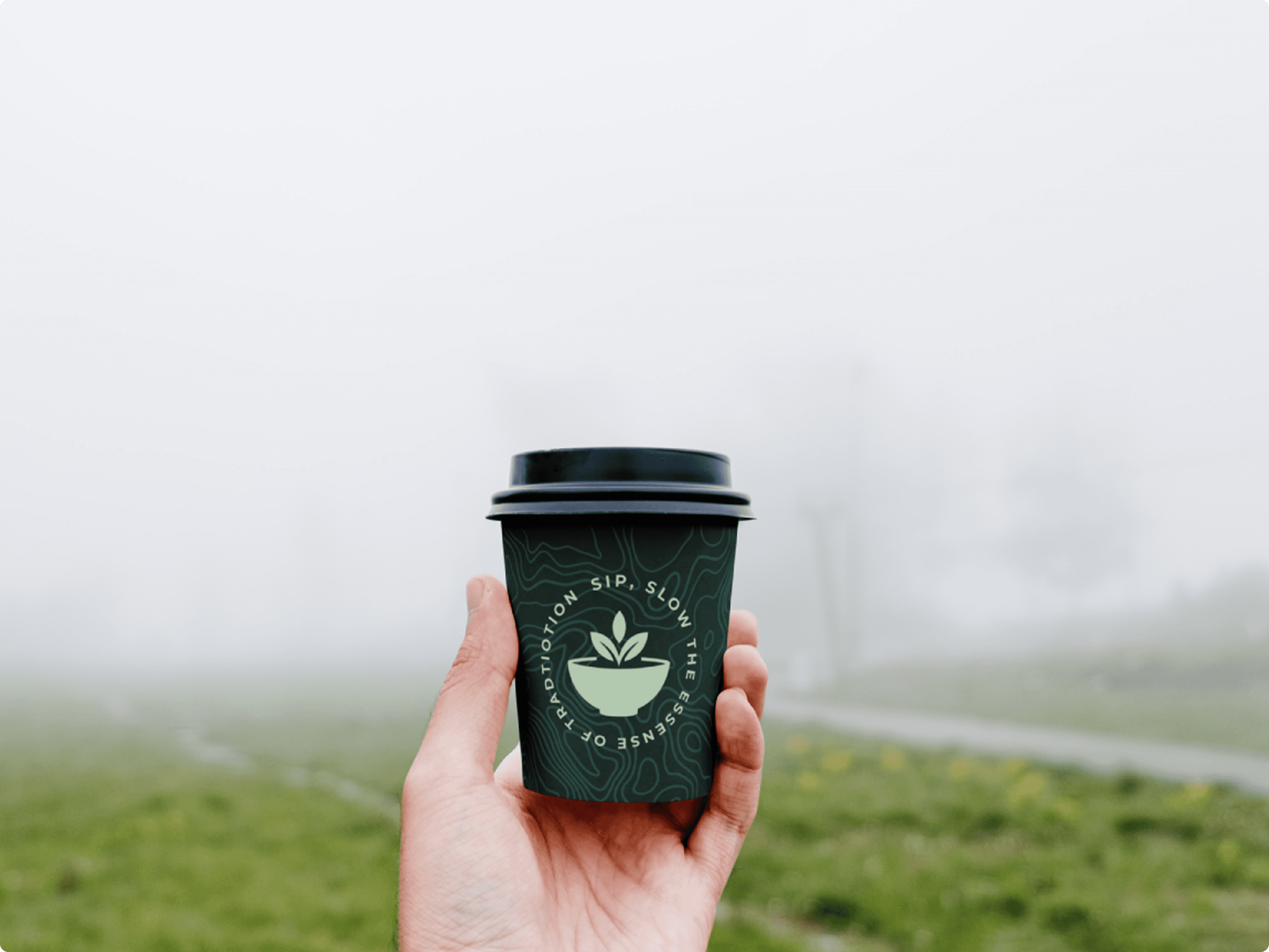 Matcha Haven takeaway matcha cup held outdoors in natural environment