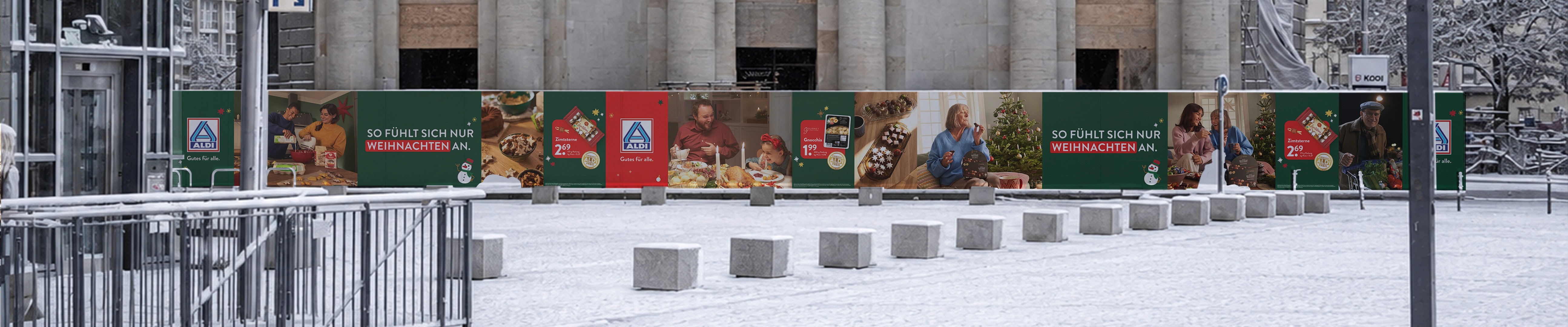 Large-scale ALDI Christmas campaign displayed across an urban public space.