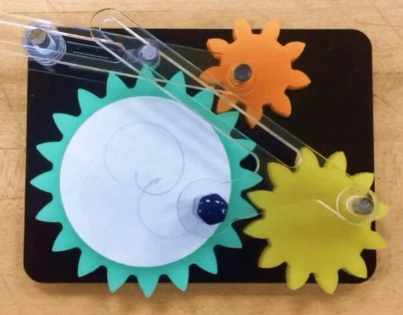 Final Spiro-Gear Assembly: Featuring injection molded plastic gears, laser cut acrylic linkages and base