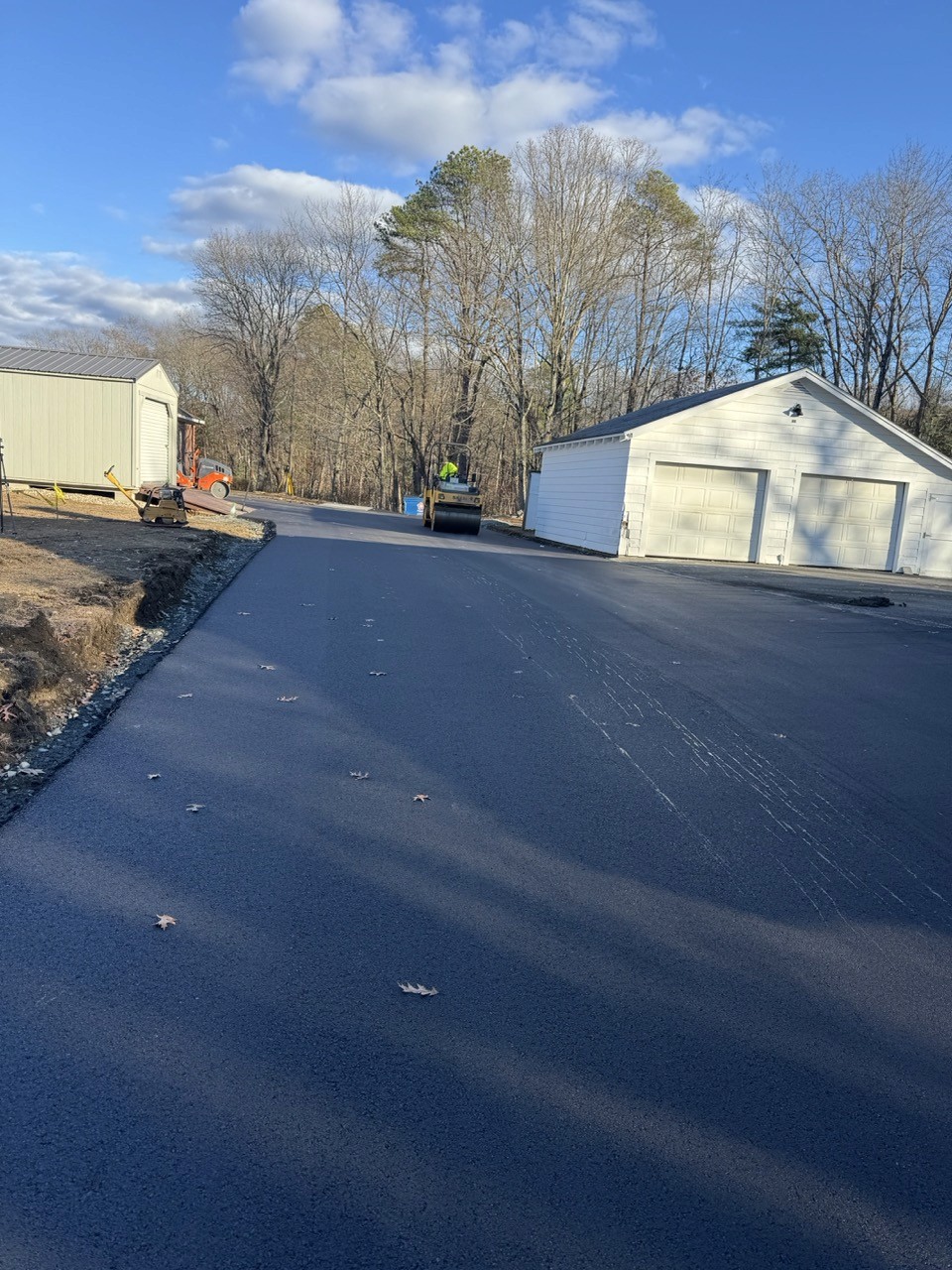 After: Paver laying the first pass on a garage apron