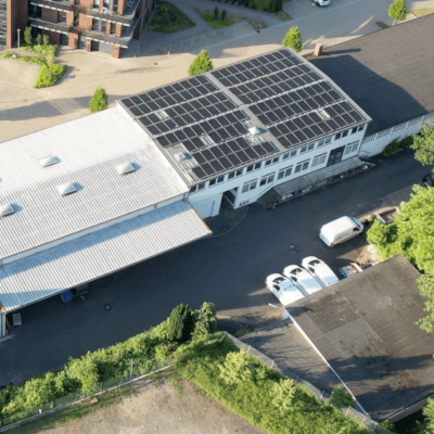 husband and wife working happily on a laptop