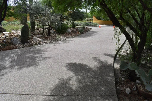 Desert home with new driveway and xeriscape in Tucson
