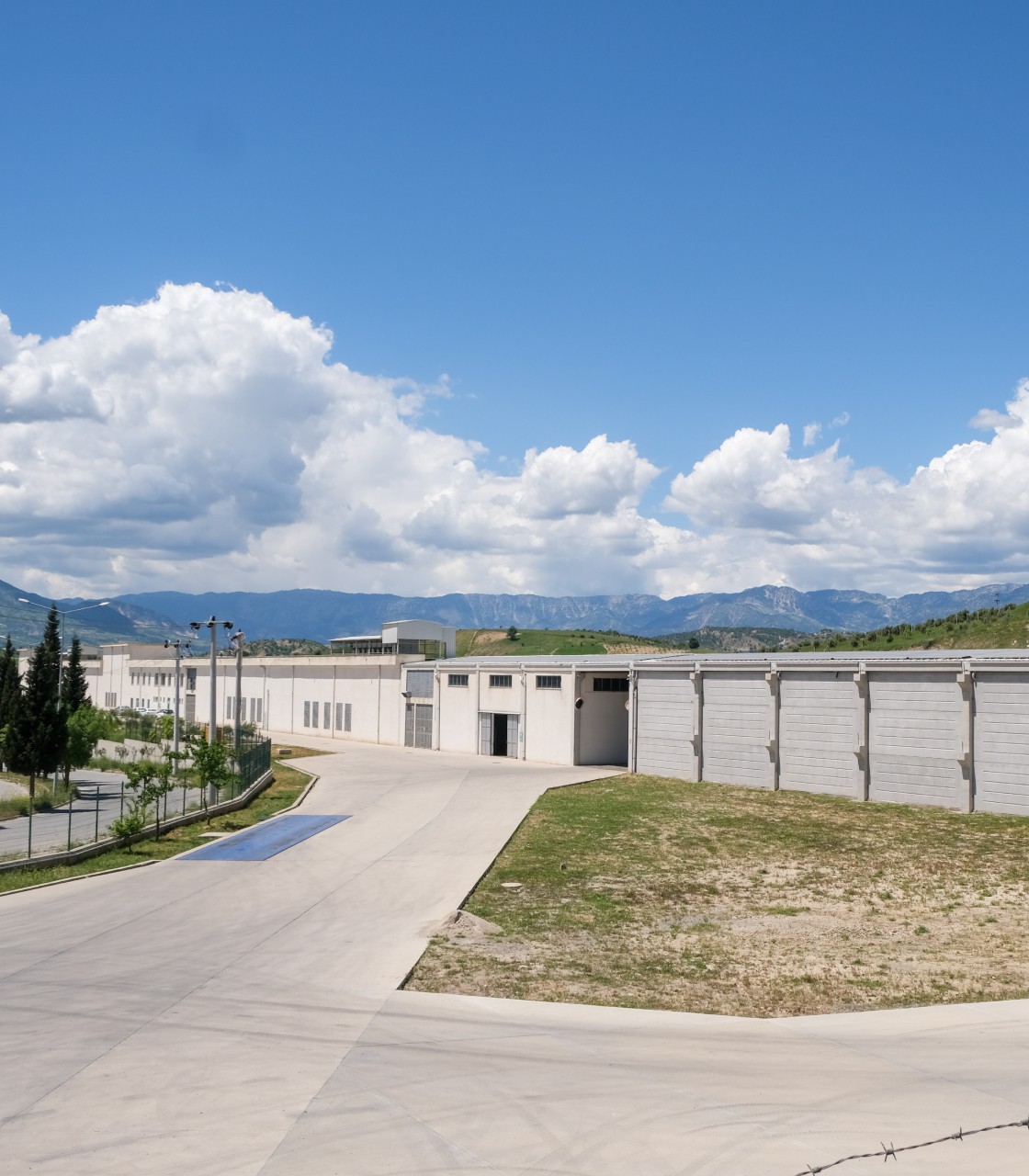 Certified textile factory exterior with production and compliance facilities