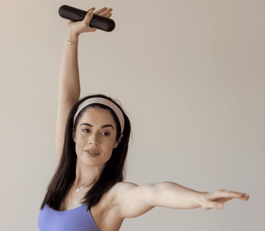 Black cosmetic product bottle against a dark background