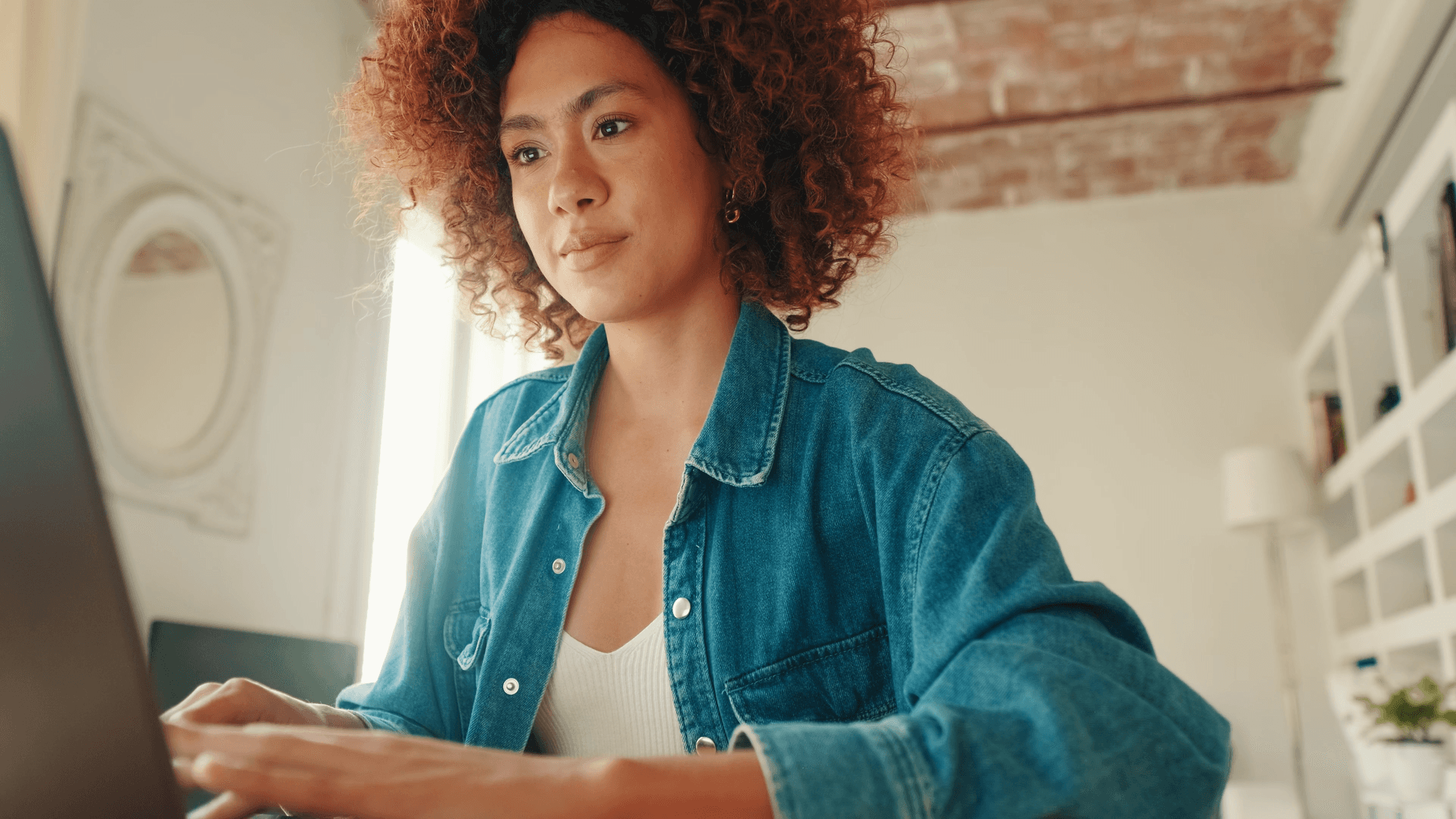 Woman working on a computer.