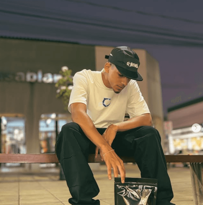 Man in white t-shirt front photo