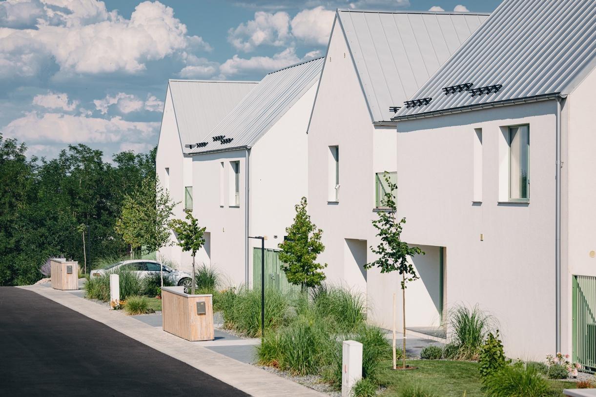 A row of white houses
AI-generated content may be incorrect.
