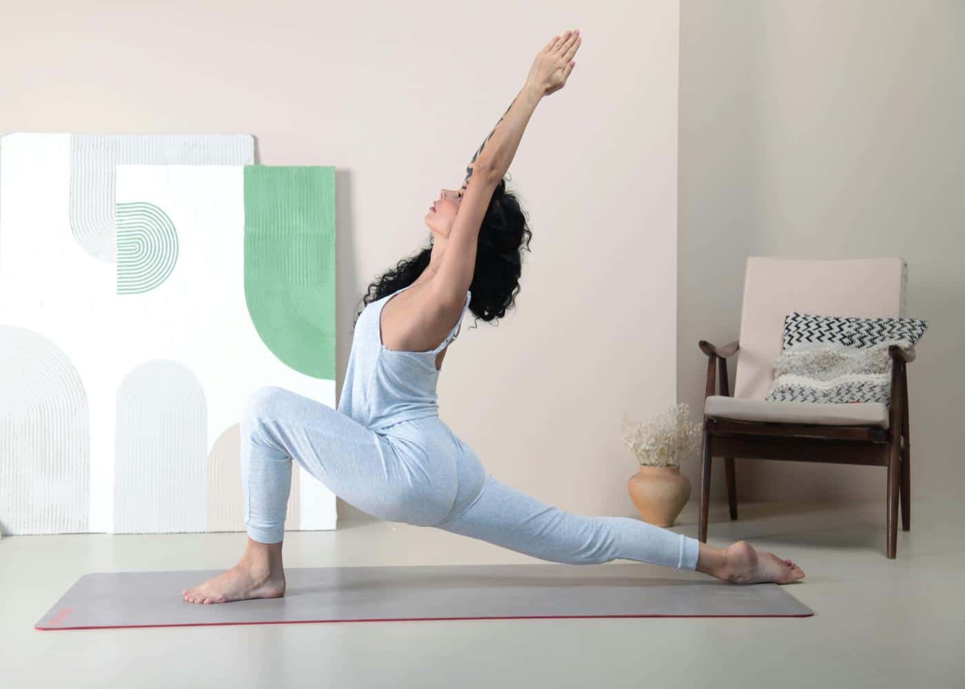 Yoga techniques for flexibility - Woman stretching on a yoga mat