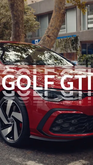 The words “Golf GTI” over a red car