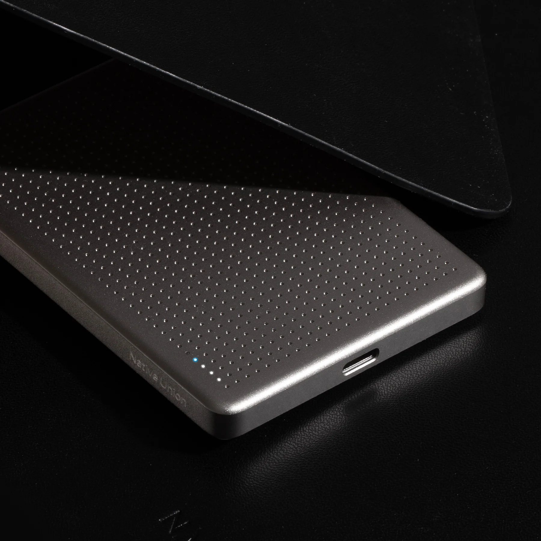 Close-up view of grey portable power bank