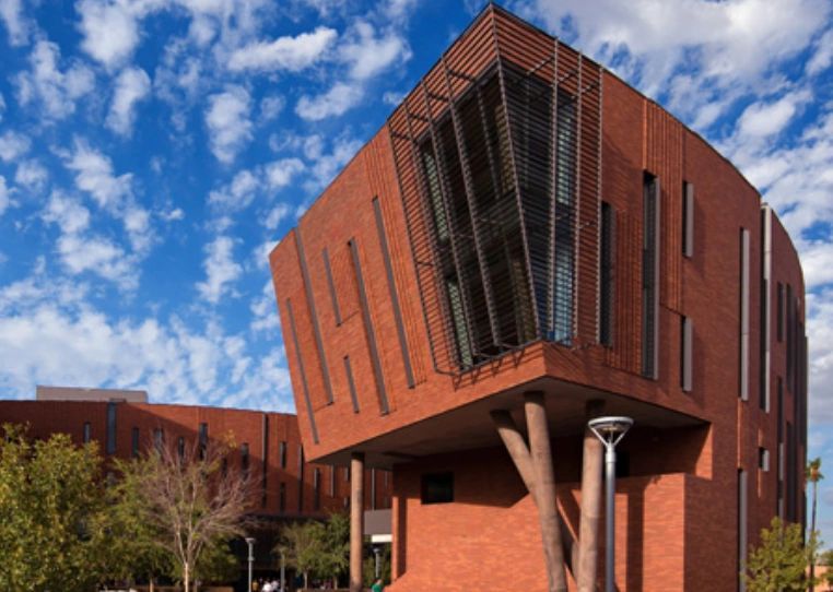a black and white living room with a large tv