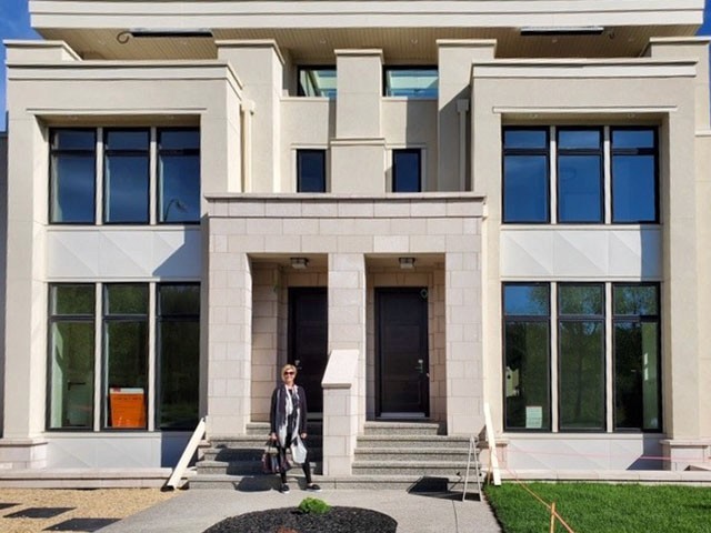 Image of KHD Homes luxury home exterior with modern design and construction elements.